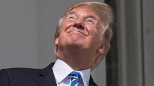 The sitting president of the United States stares at the sun.