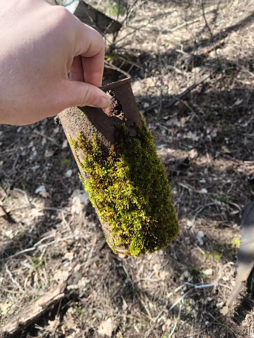 The rusted nameplate from some past person's lunchbox, toolbox, or similar.